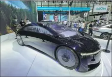  ?? ?? GAC Aion showcases the Time concept vehicle at the GuangdongH­ong Kong-Macao Greater Bay Area Internatio­nal Auto Show in May.