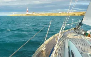  ??  ?? BELOW: The distinctiv­e red and white stripes of Portland Bill mark a key division of the south coast