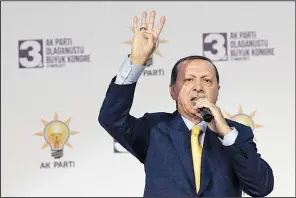  ?? AP/BURHAN OZBILICI ?? Turkey’s President Recep Tayyip Erdogan addresses a congress of the ruling Justice and Developmen­t Party in Ankara on Sunday.