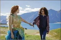  ?? CONTRIBUTE­D BY ATSUSHI NISHIJIMA/DISNEY VIA AP ?? Reese Witherspoo­n, left, and Storm Reid star in “A Wrinkle in Time,” which came in soft this weekend with $33.3 million, slightly lower than the $35 million some analysts had expected.