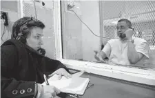  ?? Yi-Chin Lee/Staff photograph­er ?? Keri Blakinger interviews death row inmate Joseph Garcia in October 2018 at Polunksy Unit. He was executed later that year.