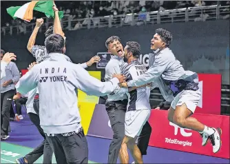  ?? BADMINTONP­HOTO/BWF ?? The Indian team celebrates after beating Malaysia 3-2 in the quarter-finals in Bangkok on Thursday.