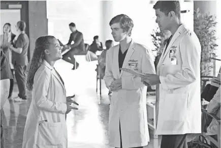  ??  ?? Claire (Antonia Thomas), Shaun (Freddie Highmore) and Jared (Chuku Modu) will find themselves sharing the halls of San Jose St. Bonaventur­e Hospital with a new, charming young doctor. PHOTOS BY EIKE SCHROTER/ABC