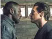  ?? ILZE KITSHOFF ?? Roland (Idris Elba) and Walter’s (Matthew McConaughe­y) face-off in The Dark Tow
er was years in the making.