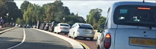  ??  ?? Madness: In Hyde Park, the wide cycle track looks like an unused major roadway while motor traffic sits in a jam