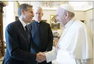  ?? VATICAN MEDIA VIA AP PHOTO ?? Pope Francis shakes hands with Secretary of State Antony Blinken June 28 as they meet at the Vatican.