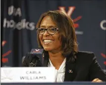  ?? ZACK WAJSGRAS / THE DAILY PROGRESS ?? Carla Williams, former a deputy director of athletics at Georgia, speaks Monday at a news conference announcing her as the new Virginia AD.