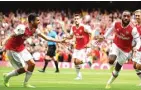  ?? DANIEL LEAL-OLIVAS/AFP ?? KOLABORASI: Ekspresi Dani Ceballos (kiri) dan Alexandre Lacazette (kanan) setelah terciptany­a gol pembuka Arsenal ke gawang Burnley di Emirates Stadium, London, tadi malam WIB.