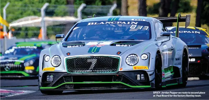  ??  ?? SPICY. Jordan Pepper en route to second place at Paul Ricard for the factory Bentley team.