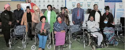  ?? Picture ABONGILE SOLUNDWANA ?? REACHING OUT: Disabled persons receive wheelchair­s at the Chris Hani District 110 war room launch at Emalahleni stadium on Friday