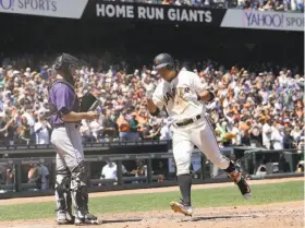  ?? Jeff Chiu / Associated Press ?? Third baseman Jae-Gyun Hwang crosses the plate after his first major-league hit, a solo home run that gave the Giants a 4-3 lead in the sixth inning.