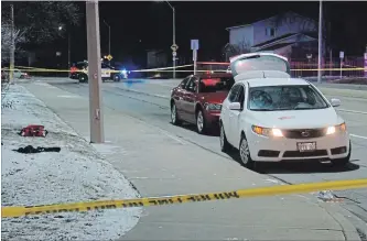  ?? DAVID RITCHIE SPECIAL TO THE HAMILTON SPECTATOR ?? One person has died following a stabbing near Upper Wentworth Street on Hamilton Mountain. Police say the investigat­ion involves more than one scene, including a paved walkway at Pauline Johnson School.