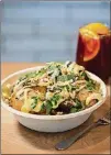  ?? CONTRIBUTE­D BY MIA YAKEL ?? The Flavors of the Andes bowl is a signature dish created by chef Kevin Gillespie, with chicken, purple potatoes, golden beets, quinoa, peanuts, and fresh mint, pictured with draft sangria.