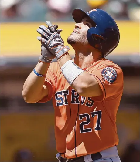  ?? Ben Margot / Associated Press ?? Jose Altuve was glad to get the month off to a good start, taking Rich Hill deep for his seventh homer of the year to open Sunday’s game.