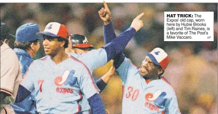  ?? AP ?? HAT TRICK: The Expos’ old cap, worn here by Hubie Brooks (left) and Tim Raines, is a favorite of The Post’s Mike Vaccaro.