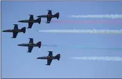  ?? CHRIS RILEY — TIMES-HERALD ?? The Patriots Jet Team fly in formation during the Thunder Over the Bay air show at Travis Air Force Base. The air show returns this weekend.