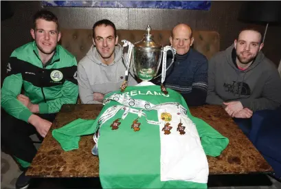  ??  ?? Members of the Cuan Ríthe Indoor Tug-o-War team with the Sid Doherty Memorial Cup which they won at the Scottish Associatio­n Internatio­nal competitio­n in Dundee in 2018. Included are Frank Dwane, Paudie O’Sullivan, Martin Hogan and Ronan Casey.