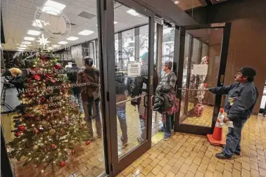  ?? Steve Gonzales / Houston Chronicle ?? Some people went to the Harris County tax office Thursday to prepay next year’s property taxes, thinking it would be beneficial to get them out of the way in advance due to changes in the U.S. tax code.