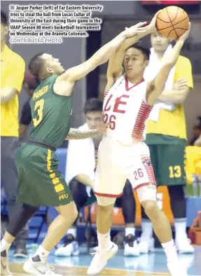  ?? CONTRIBUTE­D PHOTO ?? Jasper Parker (left) of Far Eastern University tries to steal the ball from Lucas Cullar of University of the East during their game in the UAAP Season 80 men’s basketball tournament on Wednesday at the Araneta Coliseum.