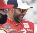  ?? BRYNN ANDERSON/AP ?? NASCAR Cup Series driver Bubba Wallace laughs before a NASCAR Cup Series race March 21 at Atlanta Motor Speedway in Hampton, Ga.