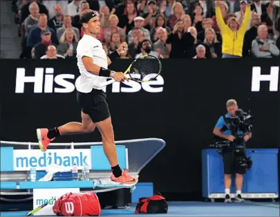  ?? Picture: TRACEY NEARMY, EPA ?? ON TOP OF HIS GAME: Rafa Nadal celebrates after beating Milos Raonic in straight sets at the Australian Open yesterday.