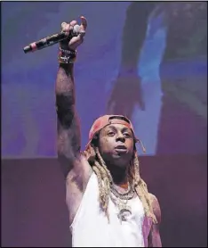  ?? GETTY IMAGES NORTH AMERICA ?? Lil Wayne is part of the V-103 Winterfest lineup on Dec. 10 at Philips Arena.