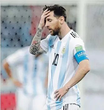  ?? PETR DAVID JOSEK
THE ASSOCIATED PRESS ?? Argentina’s Lionel Messi reacts after the third goal by Croatia during a Group D match at soccer’s 2018 World Cup in Nizhny Novgorod, Russia, on Thursday. Croatia won the contest convincing­ly, 3-0.