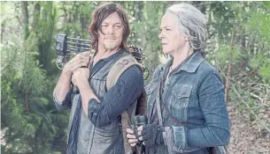  ?? JACE DOWNS AMC ?? “Walking Dead” characters Daryl (Norman Reedus) and Carol (Melissa McBride) will get their own spinoff series as the “Walking Dead” universe continues to expand.