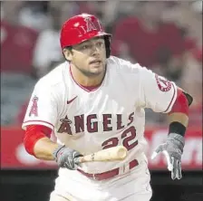  ?? Marcio Jose Sanchez Associated Press ?? ANGELS INFIELDER David Fletcher, above, last played on the same team with younger brother Dominic at Cypress High in 2013.