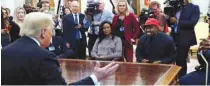  ??  ?? Trump speaks while West listens during a meeting in the Oval Office.