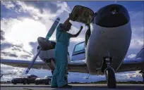  ?? RICHARD GRAULICH / THE PALM BEACH POST ?? Tony Rogers, of Boynton Beach, prepares to fly his 1960s Piper Aztec to a friend’s secure hanger at Palm Beach County Park Airport in Lantana on Thursday.