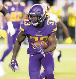  ?? AP ?? Vikings running back Dalvin Cook looks for running room against Washington on Thursday night in Minneapoli­s.