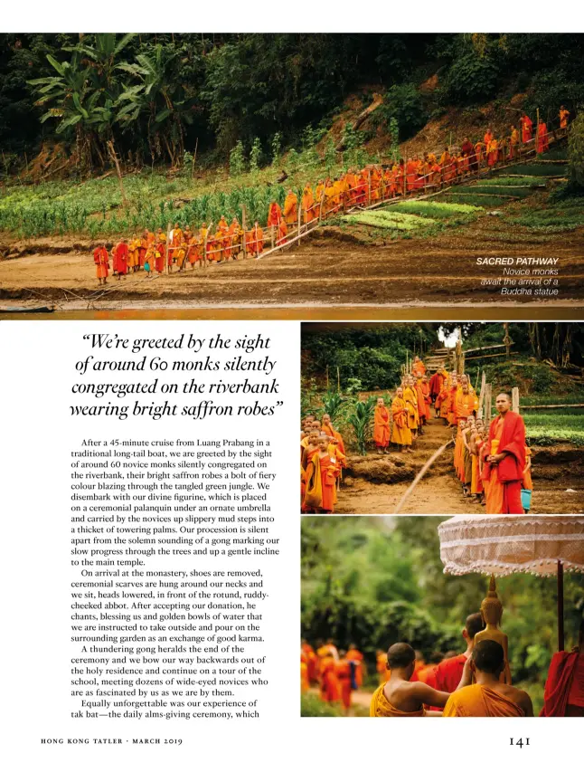  ??  ?? SACRED PATHWAY Novice monks await the arrival of a Buddha statue