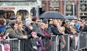  ??  ?? Crowds pay their respects in Lord Street