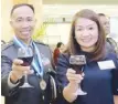  ??  ?? 2017 Metrobank Foundation Outstandin­g Filipino awardee lieutenant colonel Elmer Suderio with Lamitan City, Basilan mayor Rosita Furigay