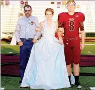  ??  ?? Lincoln freshman maid Landree Cunningham, daughter of Jason and Brandy Cunningham, escorted by her father and junior Marcus Sturgill, son of Eddie and Jannette Cox.