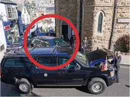  ??  ?? Beast and beauty: Security check bonnet in motorcade ahead of President’s car (circled). Above: A big hug