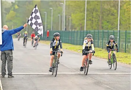  ?? ?? On your bike
Some of the young riders who took part in the events cross the finish line