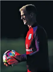  ??  ?? On his toes: Joe Hart admits that his place is under threat as England’s No 1