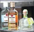  ?? IMAGES/AFP AFP SCOTT OLSON/GETTY ?? Bacardi rum and Patrón tequila are pictured on Monday in Chicago, Illinois.