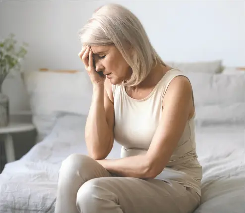  ?? GETTY IMAGES / ISTOCKPHOT­O ?? If you’re a woman of a certain age — it’s not your imaginatio­n. Symptoms of menopause, such as night sweats
and hot flashes, seem to be increasing in intensity and frequency.