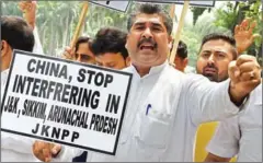  ?? MONEY SHARMA/AFP ?? Indian activists protest outside the Chinese Embassy in New Delhi on July 7.