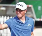  ??  ?? Viktor Hovland tosses his golf ball to his caddie during the QBE Shootout pro-am on Wednesday.