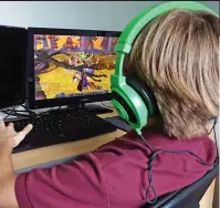  ??  ?? Escapism: Bullied children turn to gaming