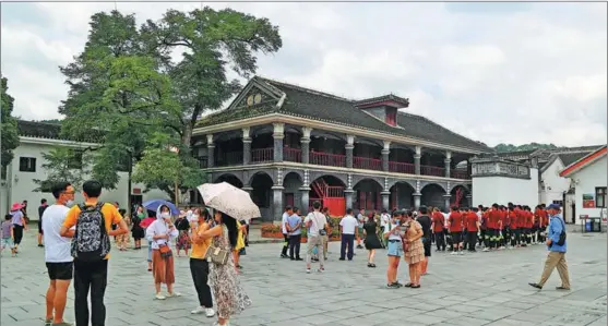  ?? YOU YOUHAI / FOR CHINA DAILY ?? People visit the Zunyi Meeting Site in Southwest China’s Guizhou province in July.