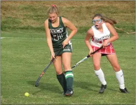  ?? ED MORLOCK/MEDIANEWS GROUP ?? Dock’s Ainsley Moyer, left, dribbles the ball while Jenkintown’s Julian Brandt defends.