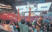  ?? Mary Altaffer, Associated Press file ?? Rick Ybarra of Plainfield, Ind., celebrates after London won the second game against the Philadelph­ia Fusion during the Overwatch League Grand Finals competitio­n at the Barclays Center in New York in July 2018.