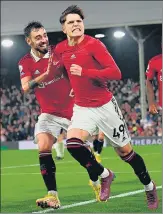  ?? ?? Manchester United's Alejandro Garnacho (R) celebrates after scoring against Fulham at Craven Cottage in London.