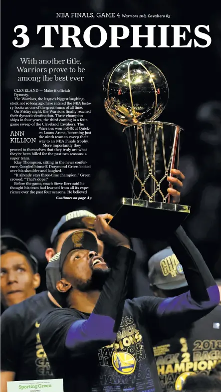  ?? Scott Strazzante / The Chronicle ?? Kevin Durant holds the championsh­ip trophy aloft after his most valuable player performanc­e led the Warriors to a sweep of the Cleveland Cavaliers in the NBA Finals.