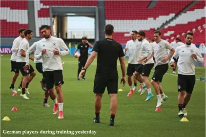  ??  ?? German players during training yesterday